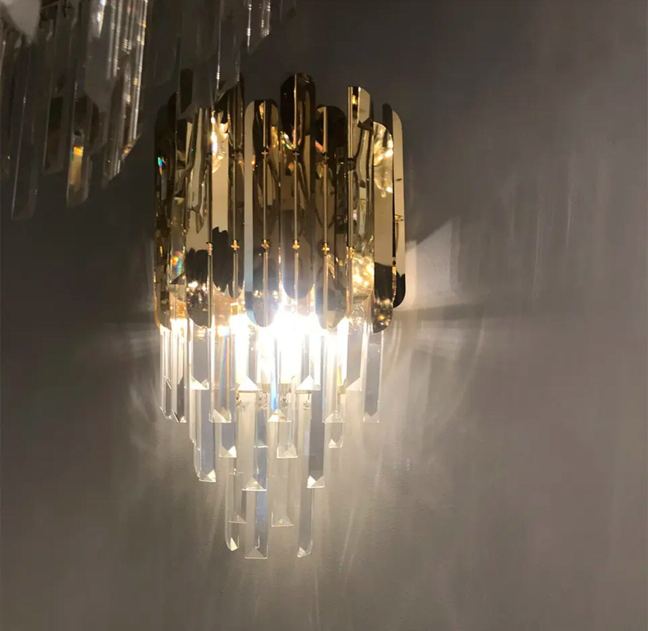 Elara Crystal Wall Lamp With Chrome And Gold Finish Dangling Crystal Bars