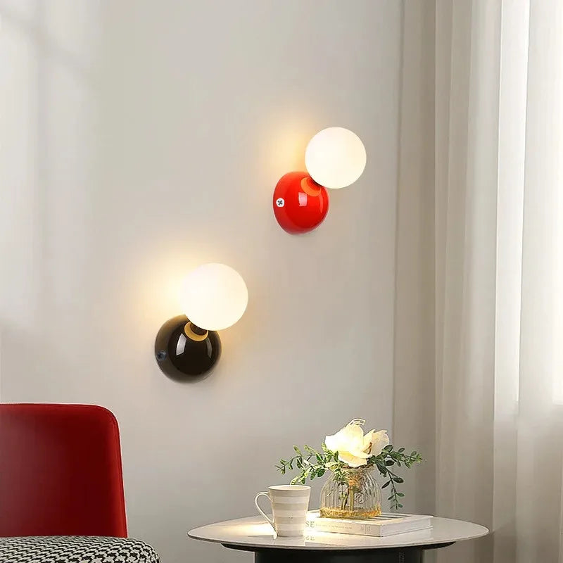 Aurea Wall Sconce In Cream Finish With Frosted Glass Ball Shade