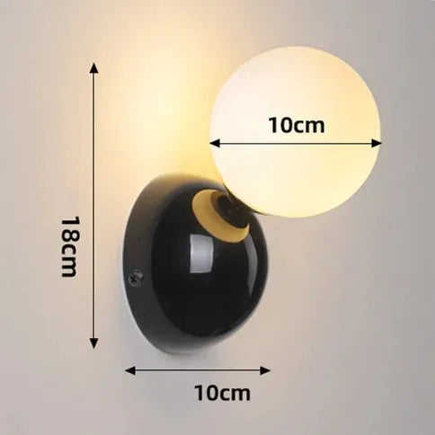 Aurea Wall Sconce In Cream Finish With Frosted Glass Ball Shade