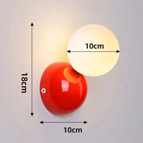 Aurea Wall Sconce In Cream Finish With Frosted Glass Ball Shade