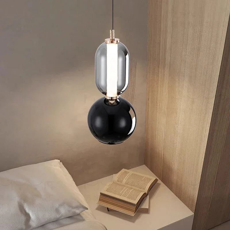 Lyrae Spherical Pendant Light With Clear Oval Shade